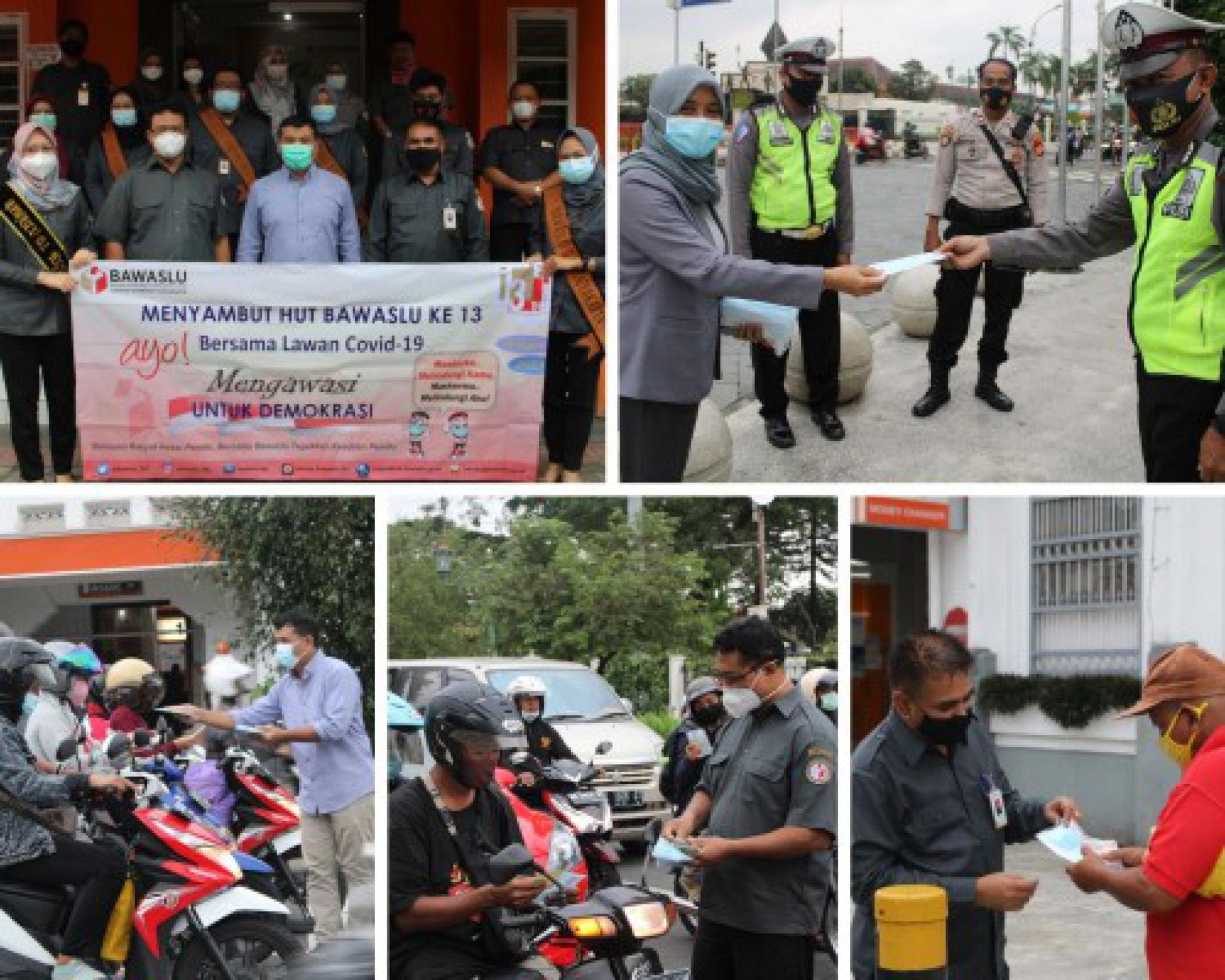Sambut HUT Bawaslu Ke-13, Bawaslu DIY Bagi-Bagi Masker di Titik Nol Kilometer 