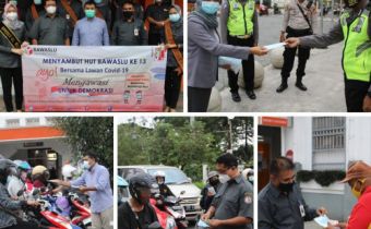 Sambut HUT Bawaslu Ke-13, Bawaslu DIY Bagi-Bagi Masker di Titik Nol Kilometer 